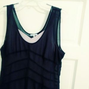 Very shear black dress with cream slip